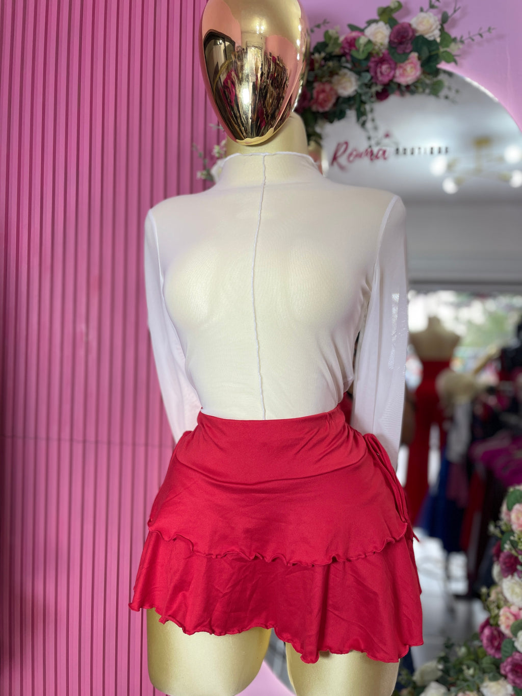 Falda short tablones con moño