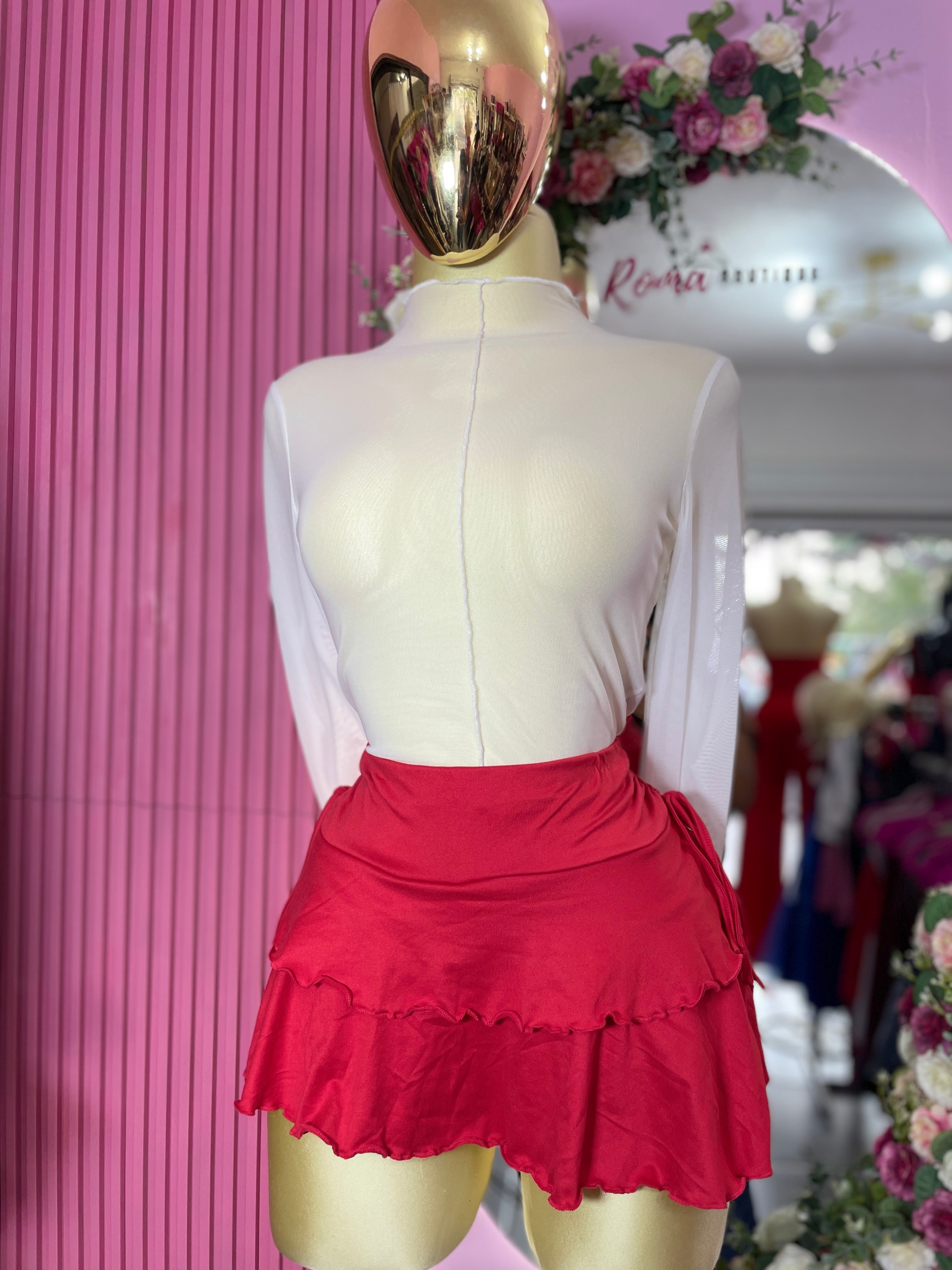 Falda short tablones con moño