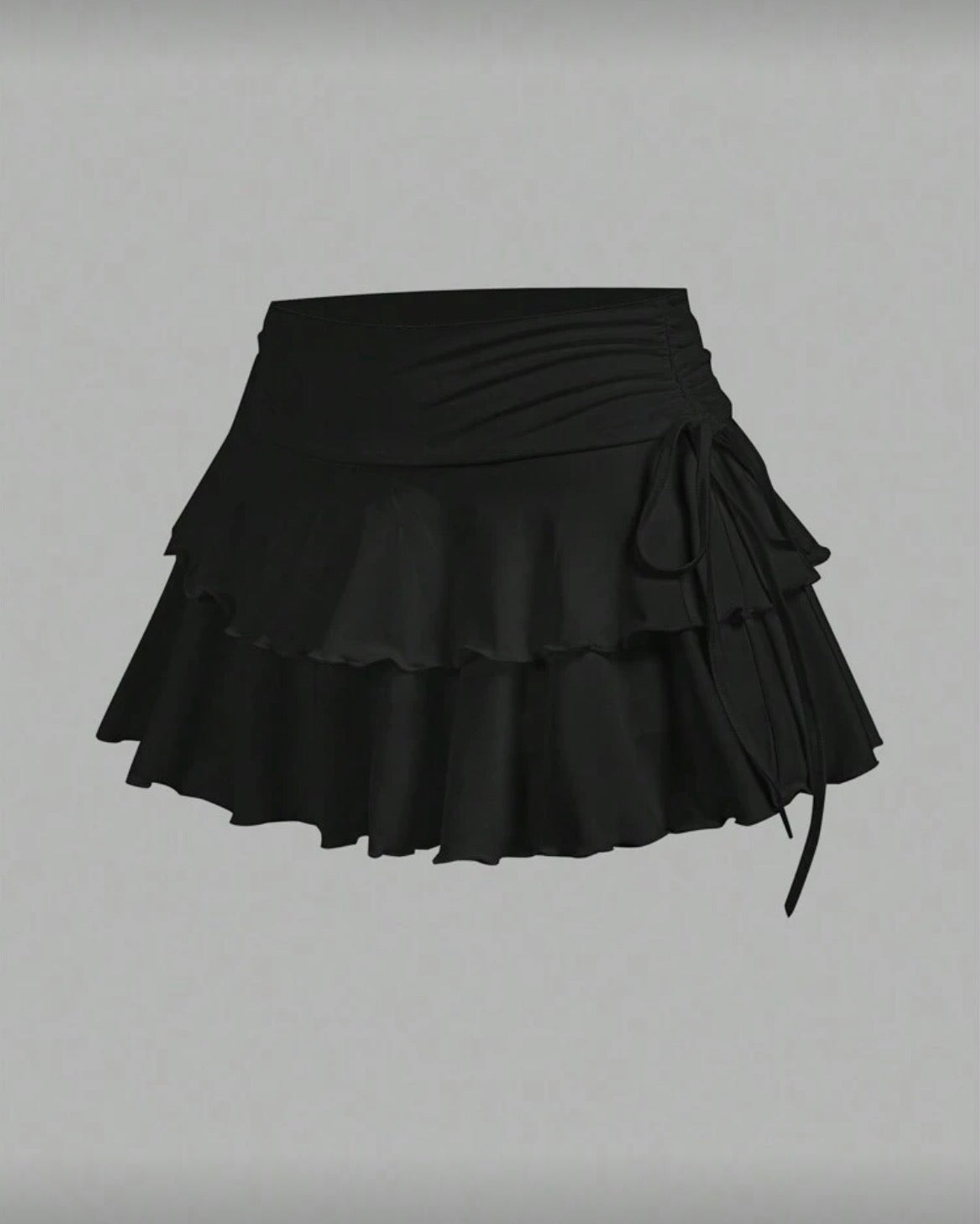 Falda short tablones con moño