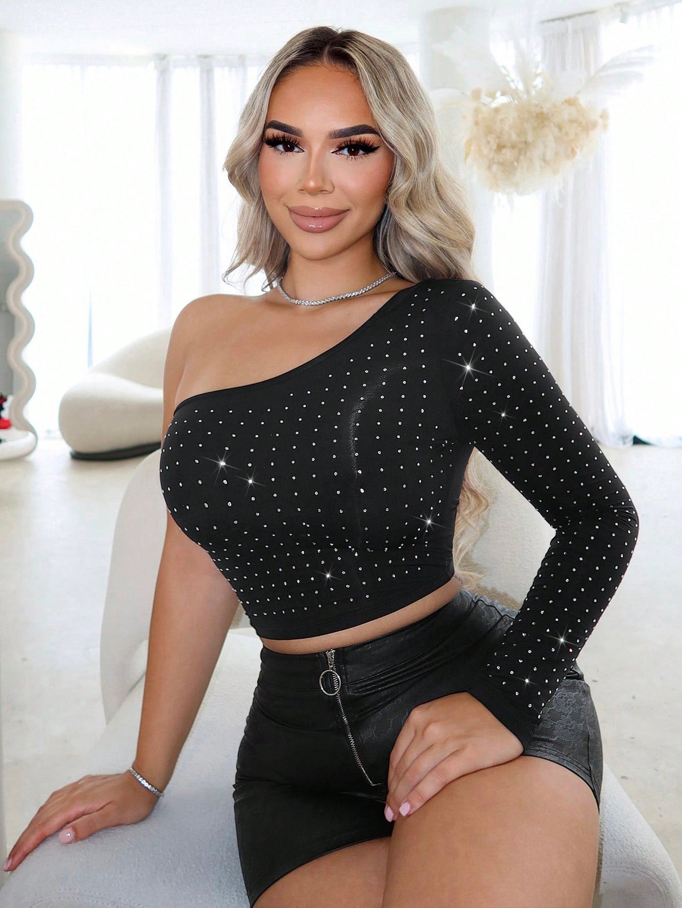 Top de una manga con pedrería