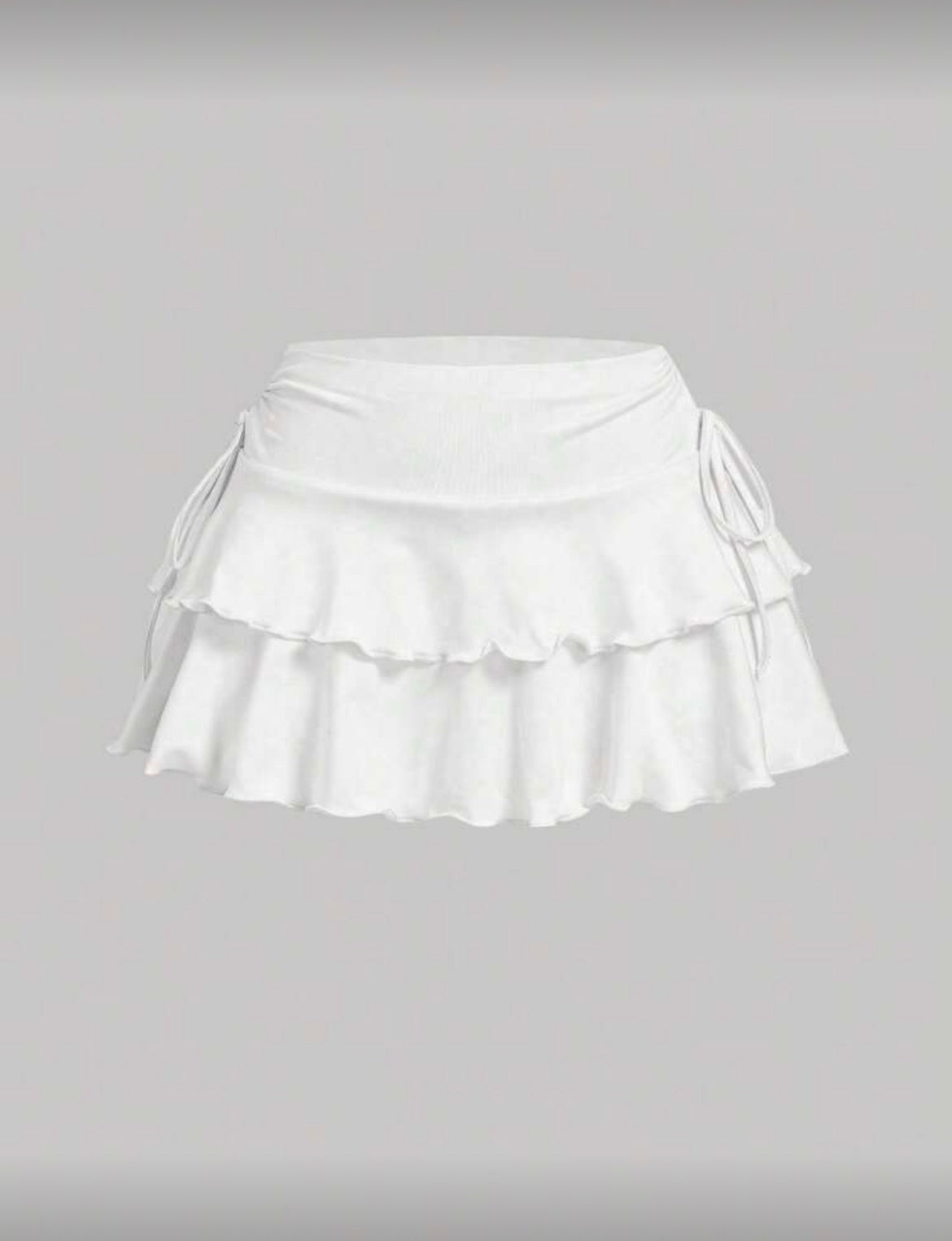 Falda short tablones con moño