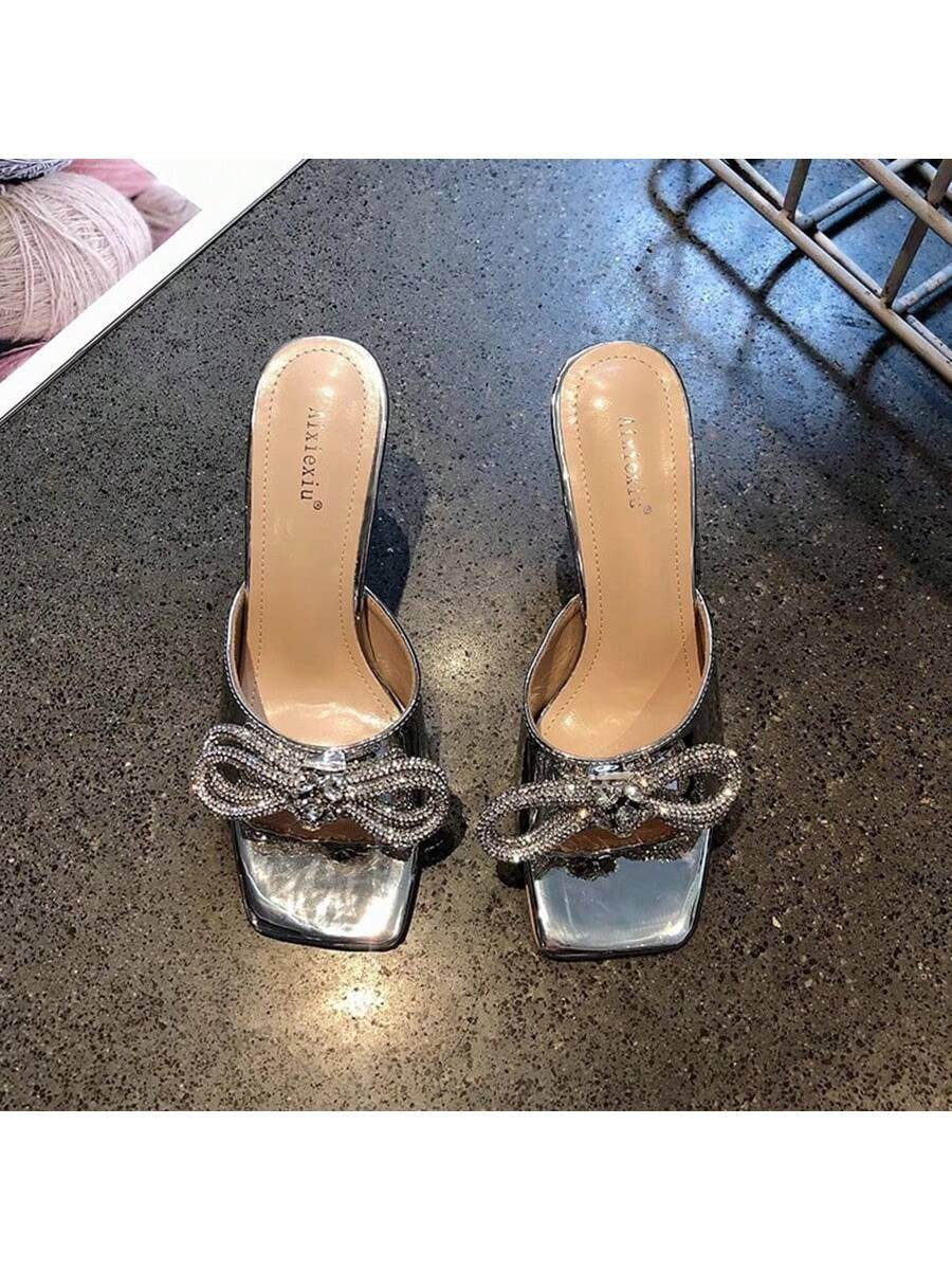 Zapatillas moño plata